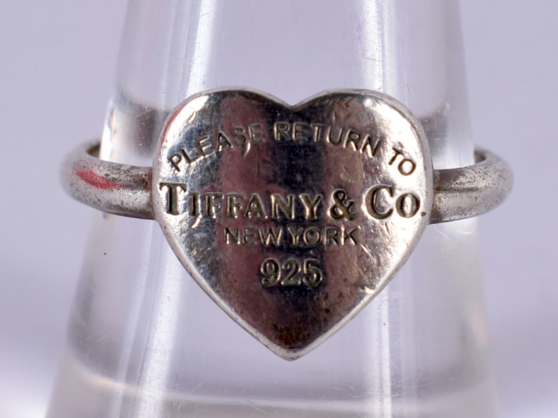 Silver Ring By Tiffany & Co With Heart Shaped Face. Stamped 925, Size O, weight 4g: Silver Ring By Tiffany & Co With Heart Shaped Face. Stamped 925, Size O, weight 4g