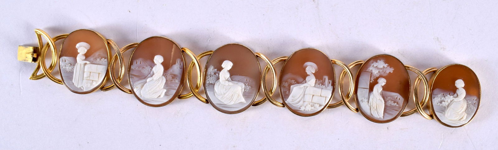 An Antique Cameo Bracelet, Each Cameo depicts a Fashionable Lady.  17cm x 2.7cm, weight 26g (1 of 5)