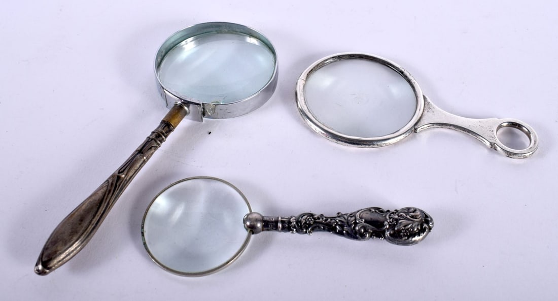 Three Silver Magnifying Glasses, Hallmarked incl Birmingham 1946.  Largest 14cm x 5.5cm, total weigh (1 of 3)