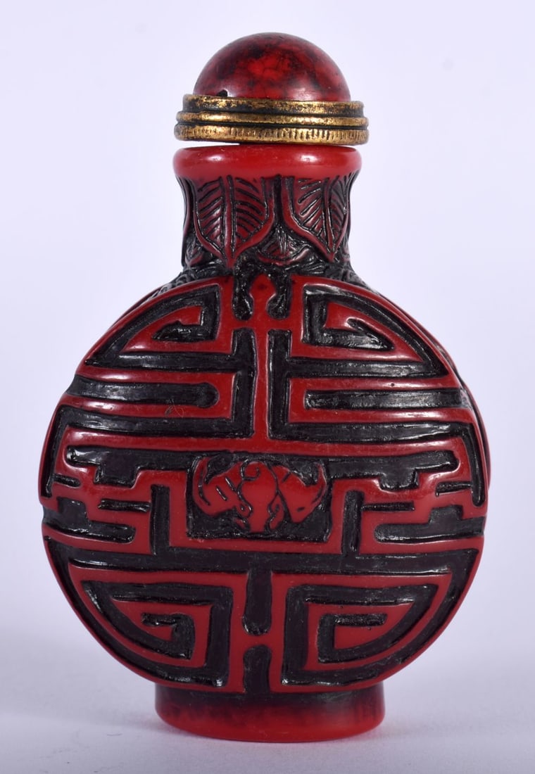 A CHINESE REPUBLICAN PERIOD RED LACQUER SNUFF BOTTLE AND STOPPER. 8 cm x 5 cm. (1 of 4)