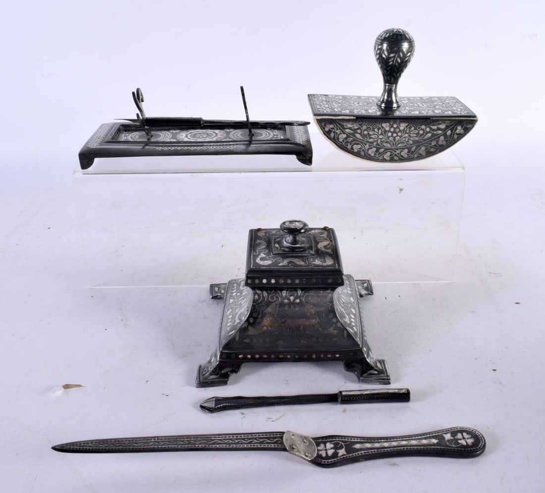 A RARE 19TH CENTURY MIDDLE EASTERN INDIAN PERSIAN SILVER INLAID DESK SET comprising of blotter, inkw (1 of 9)
