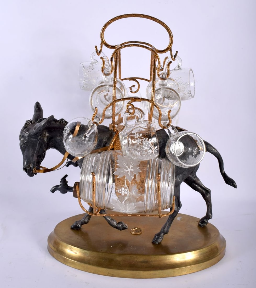A NOVELTY LATE VICTORIAN/EDWARDIAN SILVER PLATED DONKEY TANTALUS with glasses and twin barrels. Larg (1 of 4)
