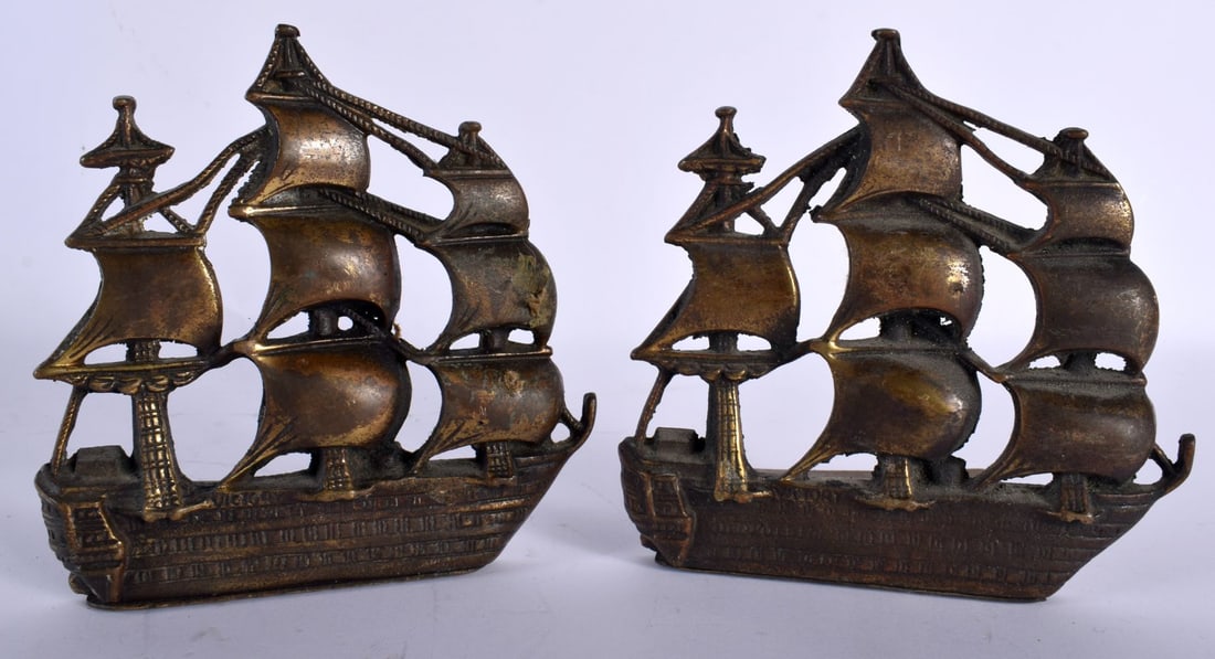 A PAIR OF ART DECO HMS VICTORY MARITIME BOOKENDS. 12 cm x 12 cm.: A PAIR OF ART DECO HMS VICTORY MARITIME BOOKENDS. 12 cm x 12 cm.