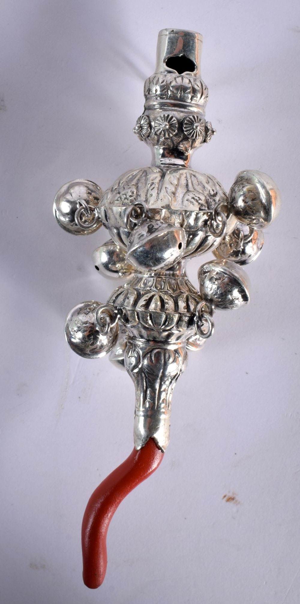 A Babies Rattle and Whistle with Coral Teether. 13.4cm x 5.2cm, weight 59g: A Babies Rattle and Whistle with Coral Teether. 13.4cm x 5.2cm, weight 59g