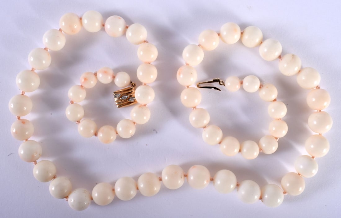 A White Coral Graduated Necklace with 14ct Gold Clasp.  Stamped 14K.  Length 59cm, Largest Bead 10.6 (1 of 3)