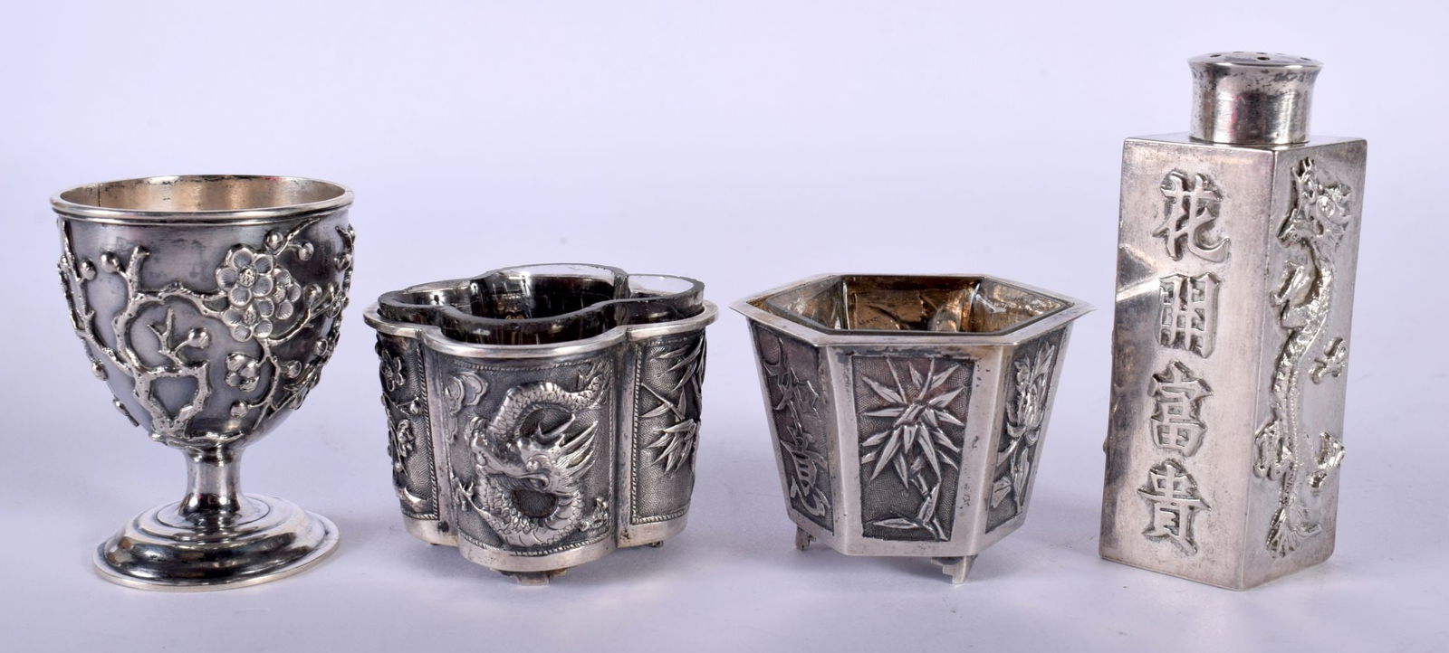 A Chinese Silver Three Piece Cruet Set with Egg Cup. Chinese Marks, Pepper Pot 6.5cm x 3cm x 2.4cm,: A Chinese Silver Three Piece Cruet Set with Egg Cup. Chinese Marks, Pepper Pot 6.5cm x 3cm x 2.4cm, weight of silver 116.56g (4)