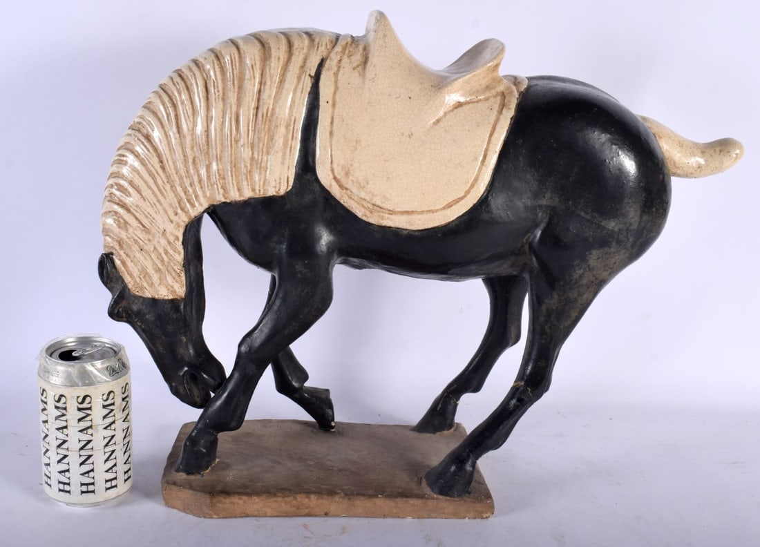 A LARGE 19TH CENTURY CHINESE BLACK GLAZED POTTERY FIGURE OF A HORSE Tang style. 36 cm x 26 cm. (1 of 5)