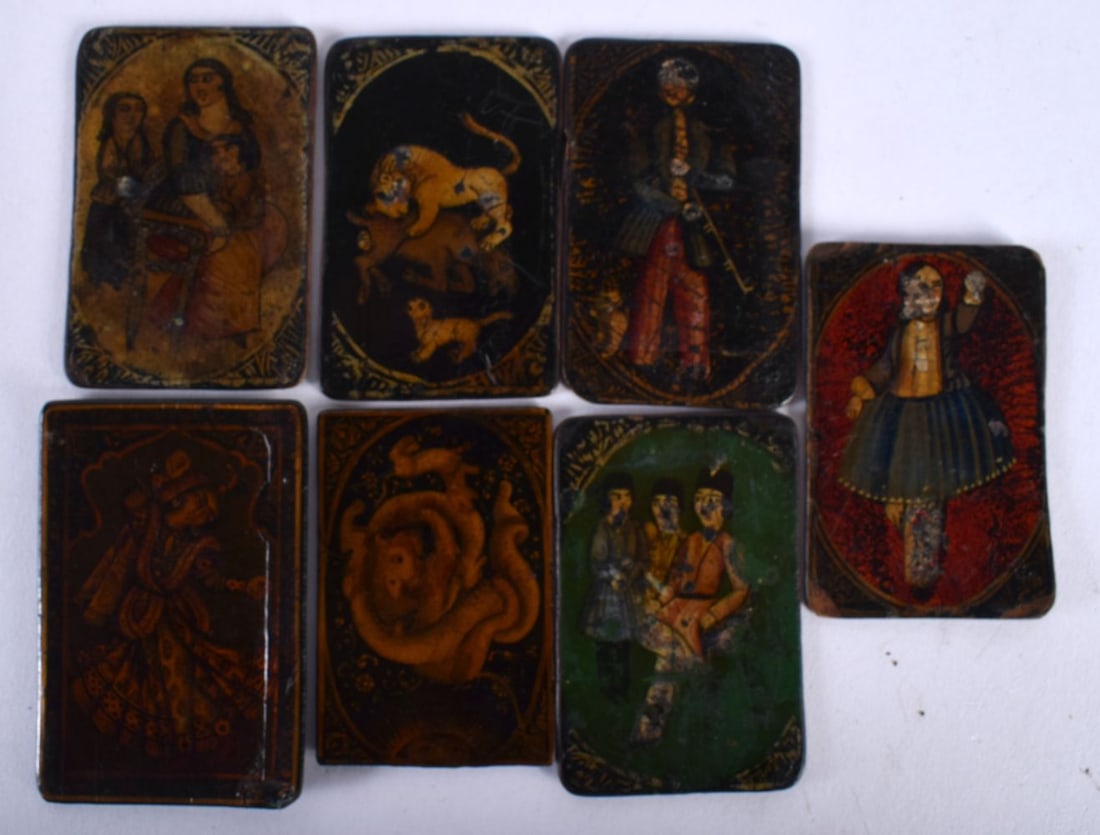 AN UNUSUAL SET OF SEVEN 19TH CENTURY PERSIAN IRANIAN QAJAR LACQUER PAINTINGS depicting figures and a (1 of 4)