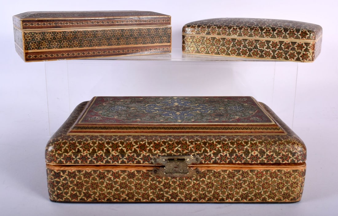 A LARGE LATE 19TH/20TH CENTURY IRANIAN PERSIAN MICRO MOSAIC CASKET together with two similar example: A LARGE LATE 19TH/20TH CENTURY IRANIAN PERSIAN MICRO MOSAIC CASKET together with two similar examples. Largest 24 cm x 14 cm. (3)