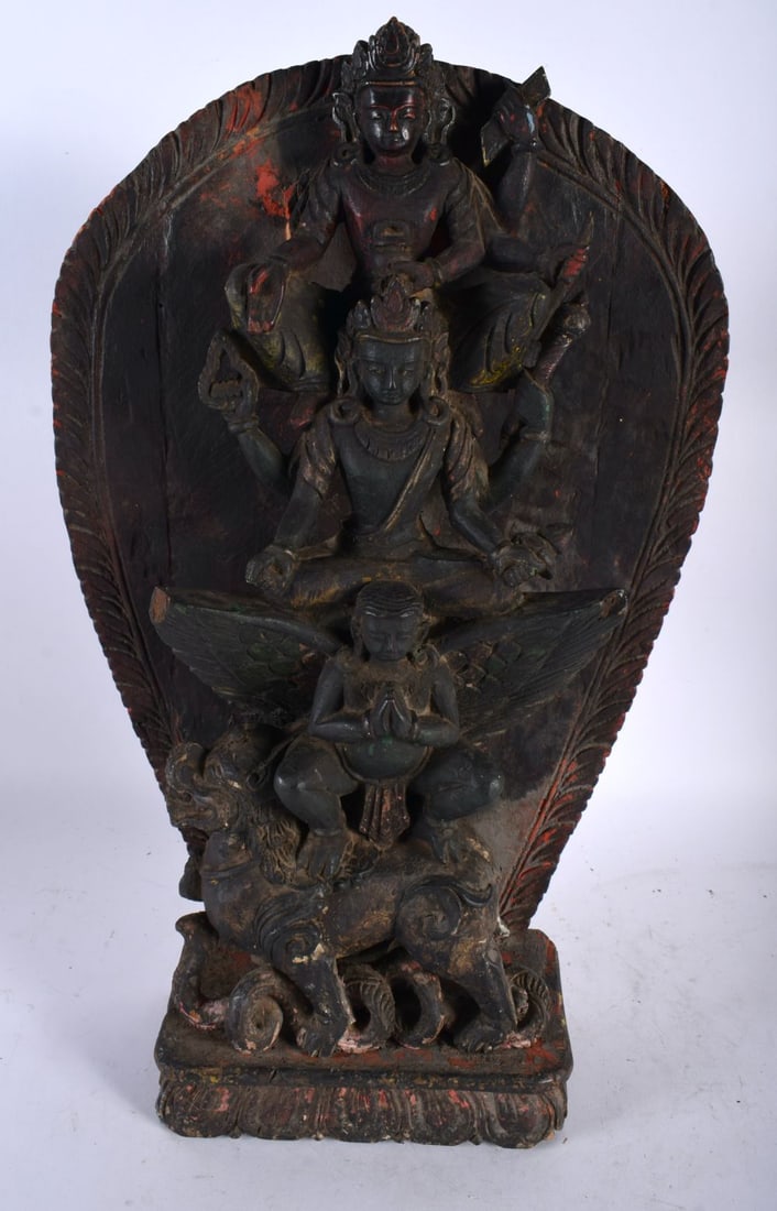A LARGE AND VERY RARE 17TH CENTURY CHINESE TIBETAN CARVED WOOD FIGURE Ming/Qing, formed with BUDDHIS: A LARGE AND VERY RARE 17TH CENTURY CHINESE TIBETAN CARVED WOOD FIGURE Ming/Qing, formed with BUDDHIST figures. 38 cm x 18 cm.
