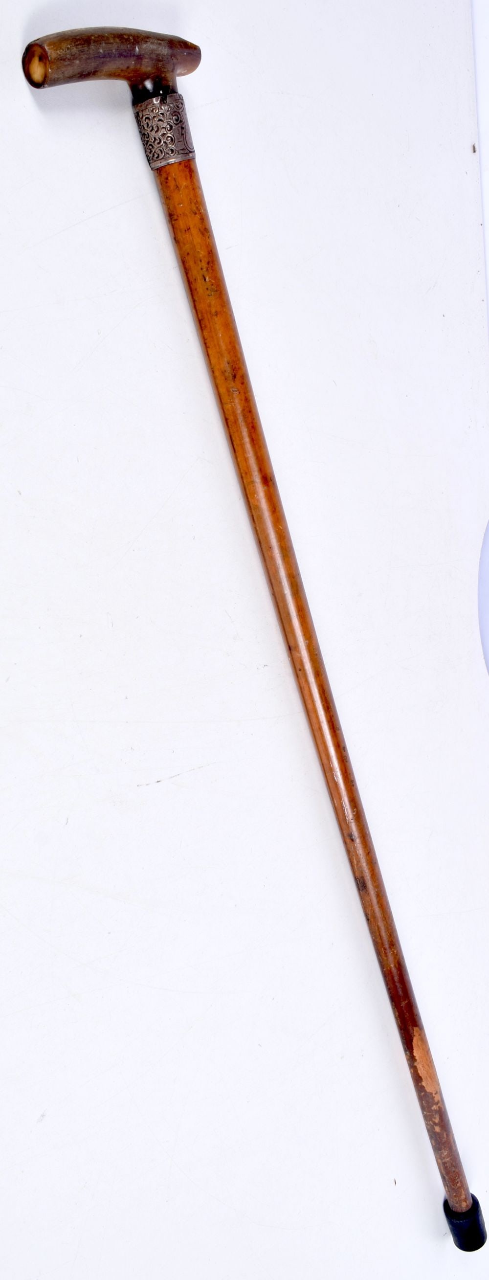 A Rhino horn handled walking cane with a SILVER collar 85 cm (1 of 3)
