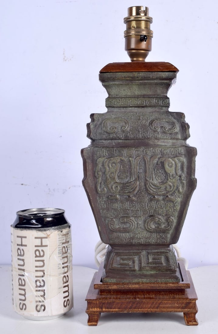 A Bronze Chinese lamp base decorative with beasts and animals (1 of 2)