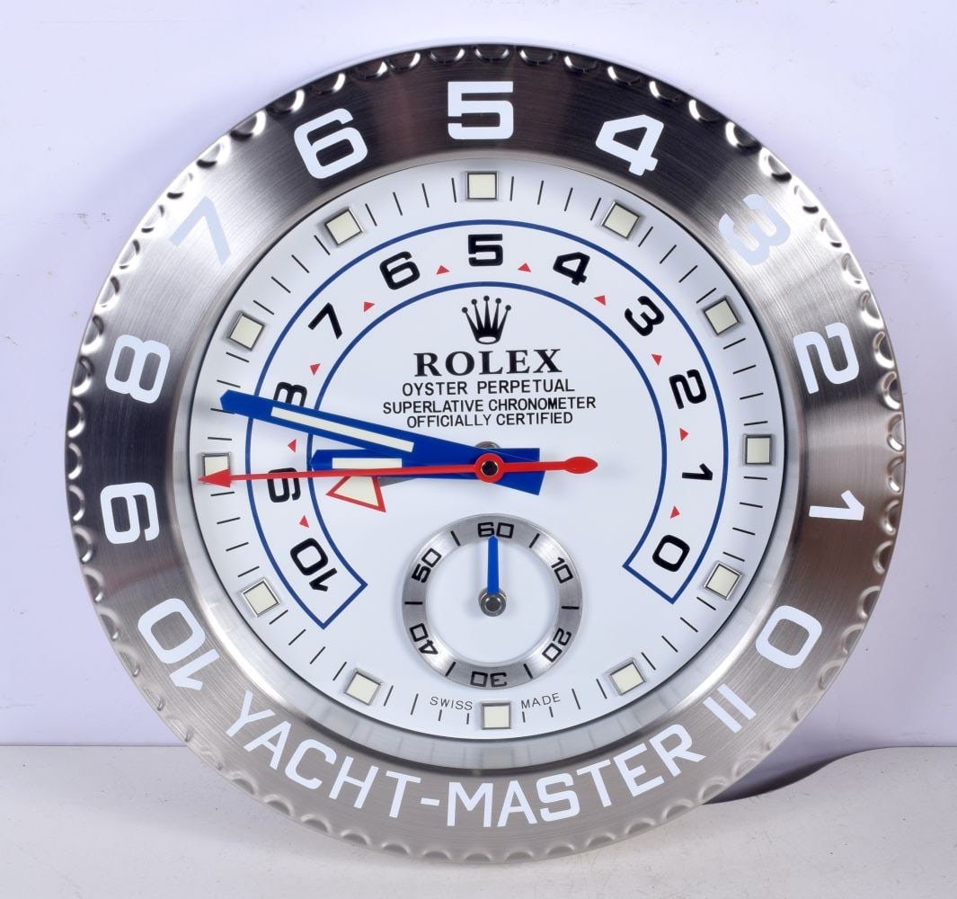 A Contemporary Rolex wall clock 34 cm. (1 of 2)