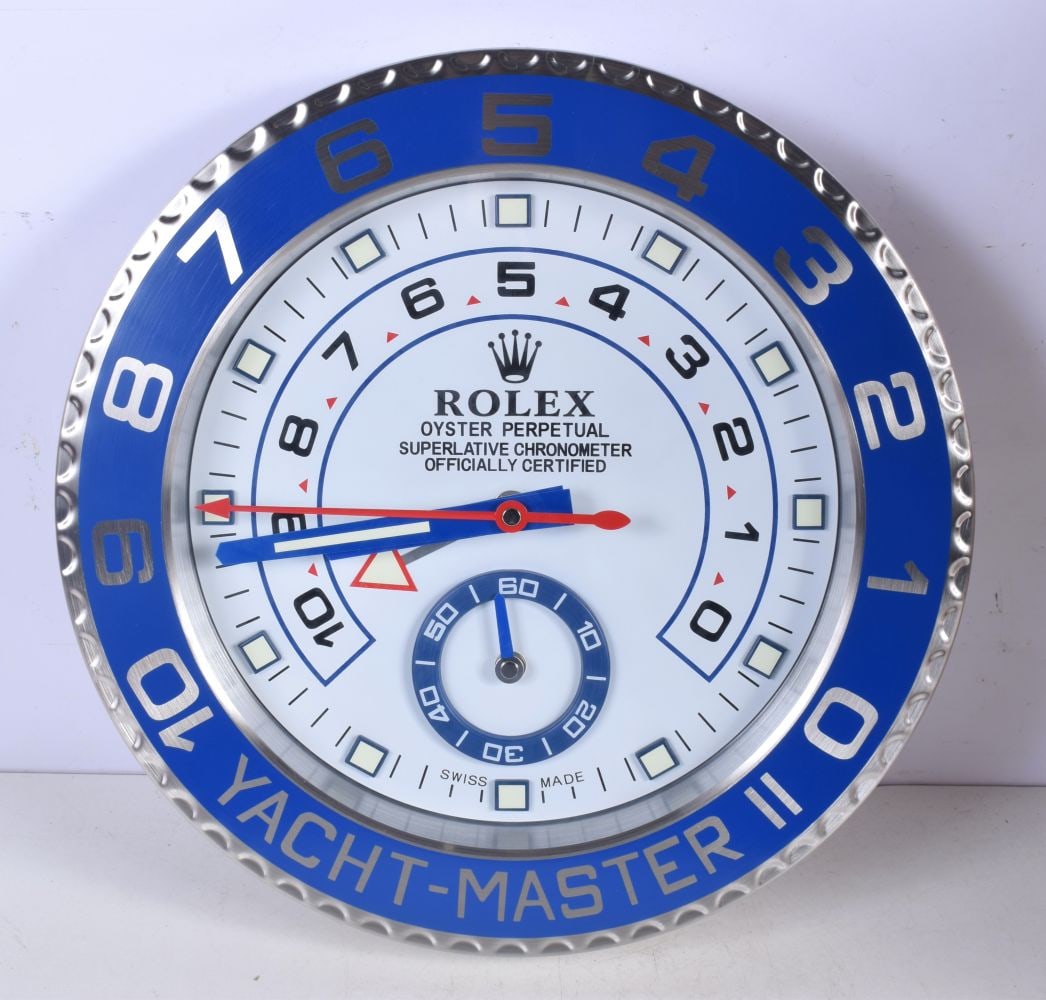 A Contemporary Rolex wall clock 34 cm. (1 of 2)