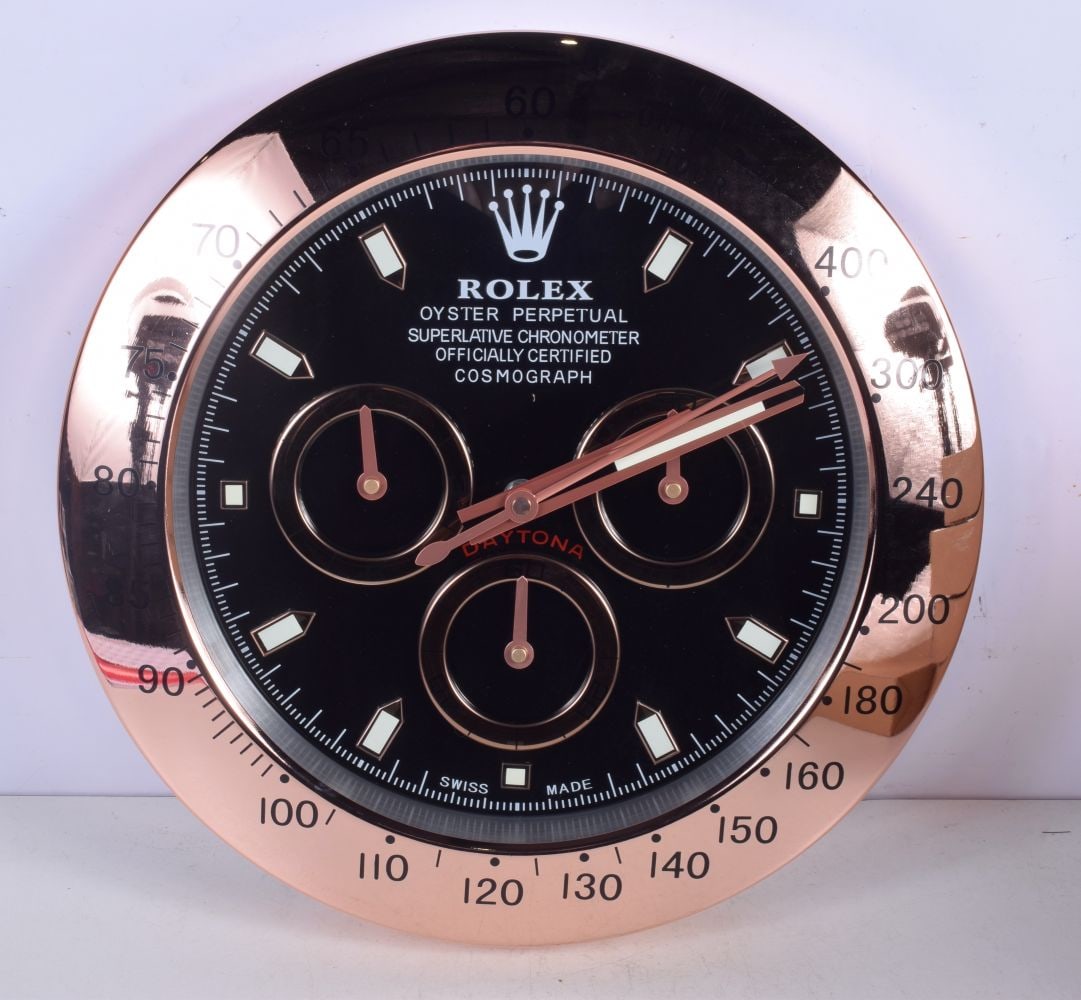 A Contemporary Rolex wall clock 34 cm. (1 of 2)