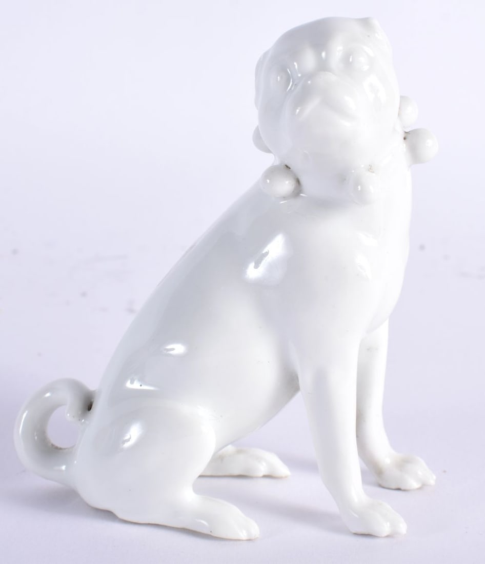 A 19TH CENTURY MEISSEN BLANC DE CHINE PORCELAIN FIGURE OF A PUG DOG modelled seated upon its hind le (1 of 5)