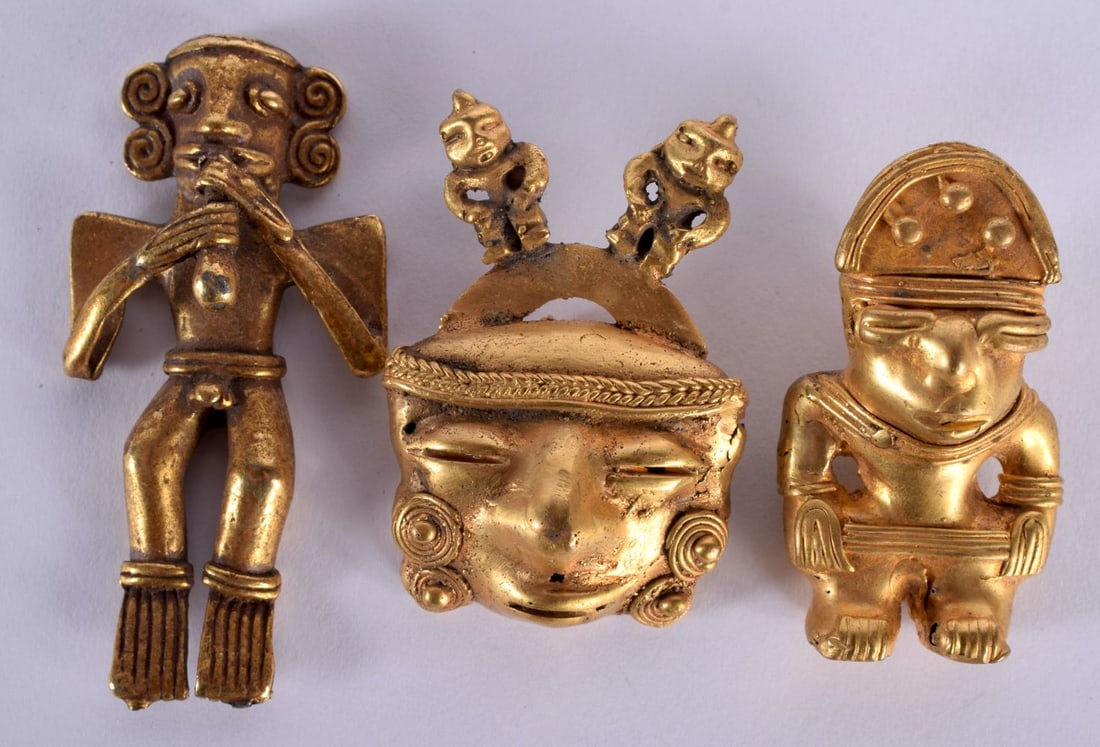 THREE EARLY SOUTH AMERICAN GOLD TRIBAL AMULETS probably C700-1400 AD, in various forms. 44 grams. La (1 of 5)