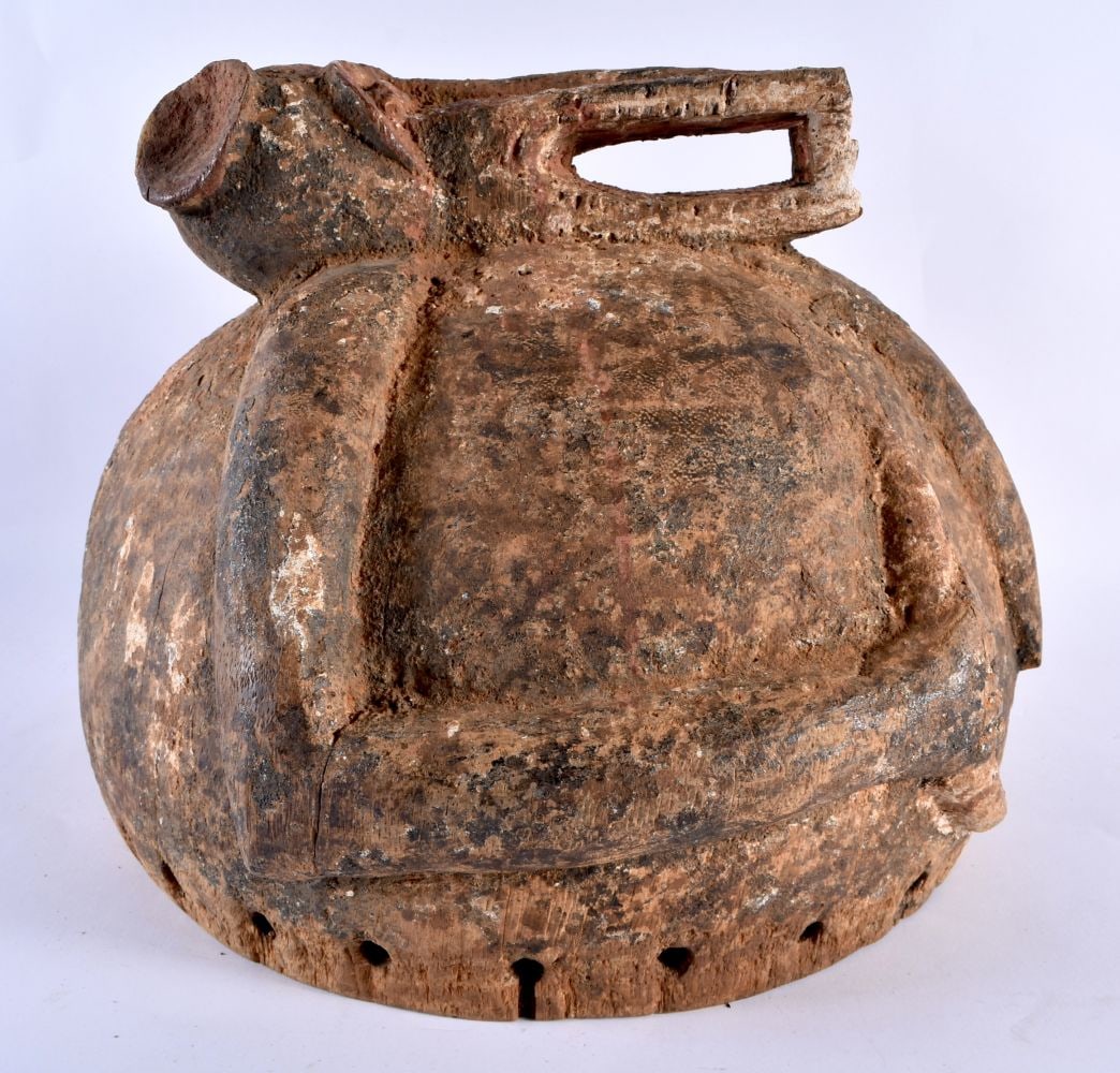 AN UNUSUAL EARLY 20TH CENTURY AFRICAN PAINTED WOOD AND HIDE TRIBAL MONKEY HELMUT. 27 cm x 27 cm. (1 of 6)