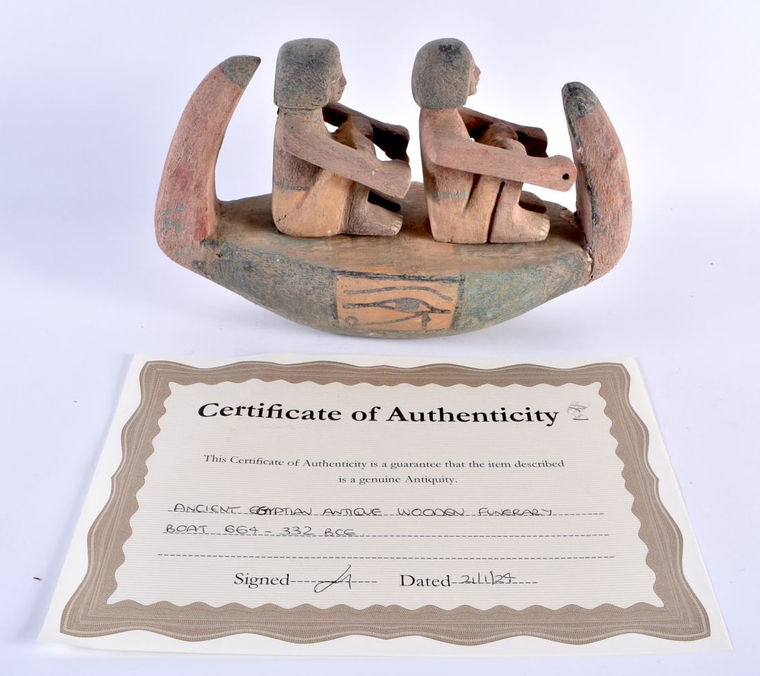 AN ANICENT EGYPTIAN CARVED WOOD FUNERARY BOAT C664-332 BC. 27 cm x 18 cm.: AN ANICENT EGYPTIAN CARVED WOOD FUNERARY BOAT C664-332 BC. 27 cm x 18 cm.