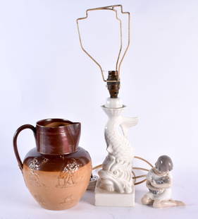 A ROYAL COPENHAGEN FIGURE together with a Casa Pupa dolphin lamp & a stoneware jug. Largest 45 cm hi: A ROYAL COPENHAGEN FIGURE together with a Casa Pupa dolphin lamp & a stoneware jug. Largest 45 cm high. (3)