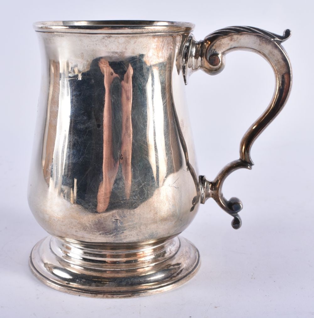 A GEORGE III SILVER TANKARD. London 1771. 336 grams. 11.5 cm x 12 cm. (1 of 6)