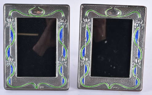 A Pair of Silver and Enamel picture Frames.  Stamped Sterling.  19.5cm x 15cm: A Pair of Silver and Enamel picture Frames. Stamped Sterling. 19.5cm x 15cm