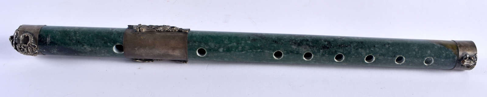 A CHINESE CARVED GREEN HARDSTONE FLUTE 20th Century. 34 cm long.: A CHINESE CARVED GREEN HARDSTONE FLUTE 20th Century. 34 cm long.