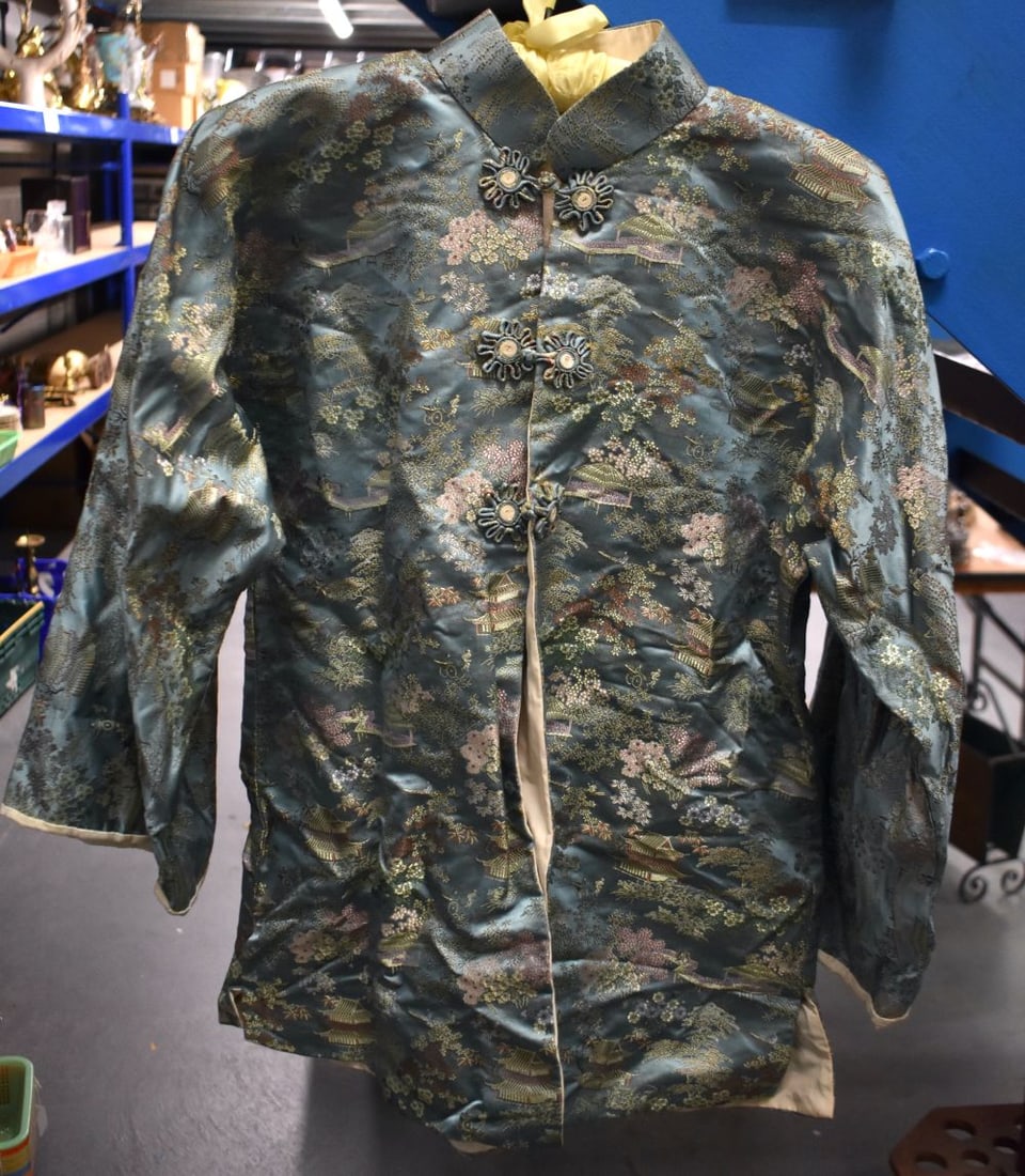 A CHINESE REPUBLICAN PERIOD SILK WORK JACKET decorated with buildings and foliage. 65 cm x 100 cm.: A CHINESE REPUBLICAN PERIOD SILK WORK JACKET decorated with buildings and foliage. 65 cm x 100 cm.