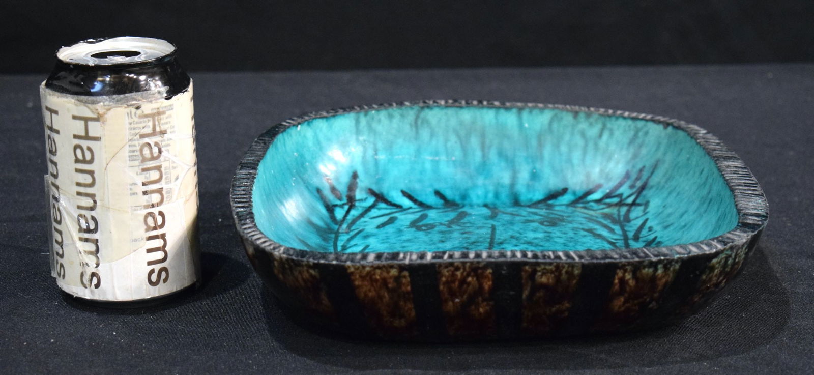 A French Mid Century pottery painted face dish signed Accolay 24 x 24 cm.: A French Mid Century pottery painted face dish signed Accolay 24 x 24 cm.