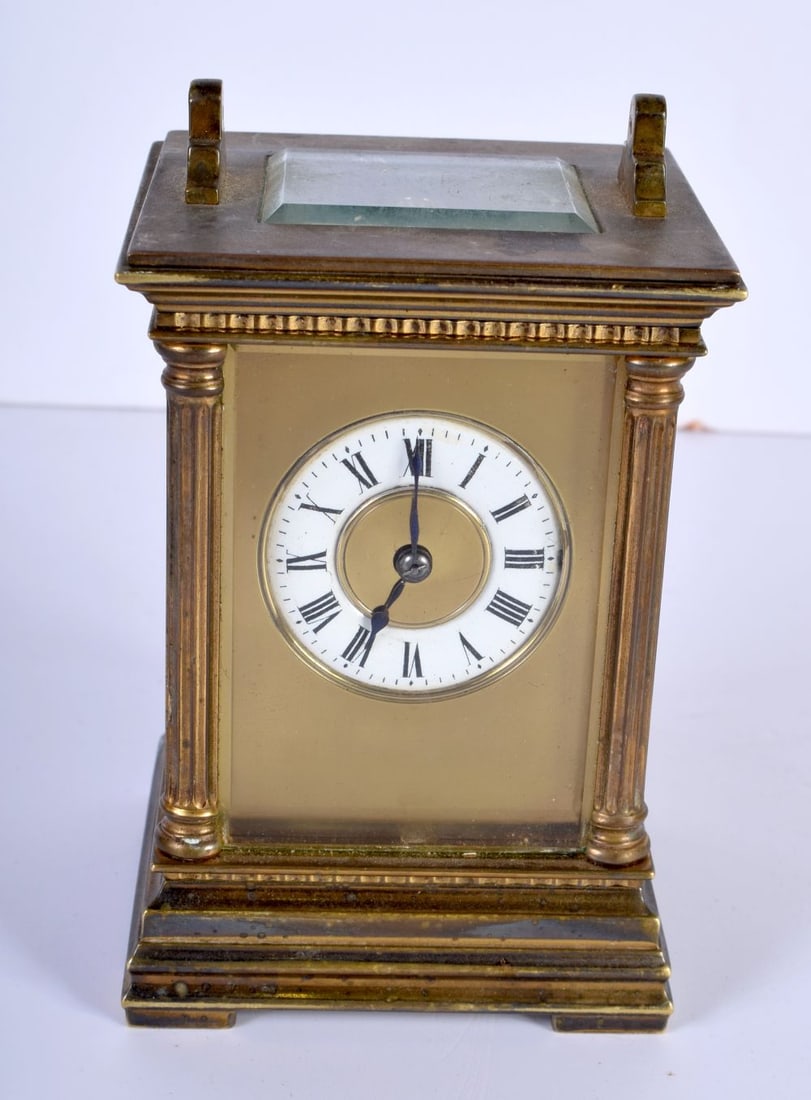 A small brass and glass carriage clock 12 cm (1 of 4)