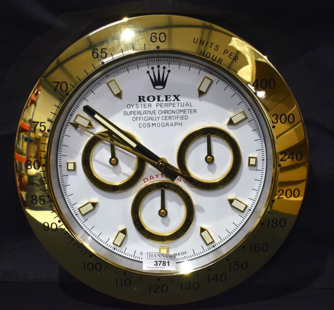 A Contemporary Rolex dealership clock 33 cm.: A Contemporary Rolex dealership clock 33 cm.