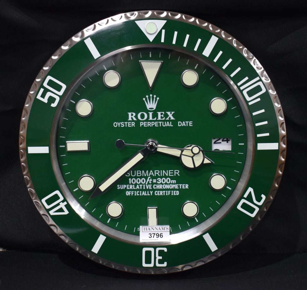 A Contemporary Rolex dealership clock 33 cm.: A Contemporary Rolex dealership clock 33 cm.