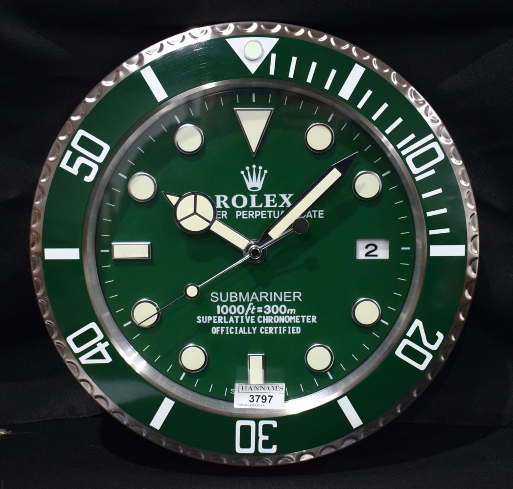 A Contemporary Rolex dealership clock 33 cm.: A Contemporary Rolex dealership clock 33 cm.