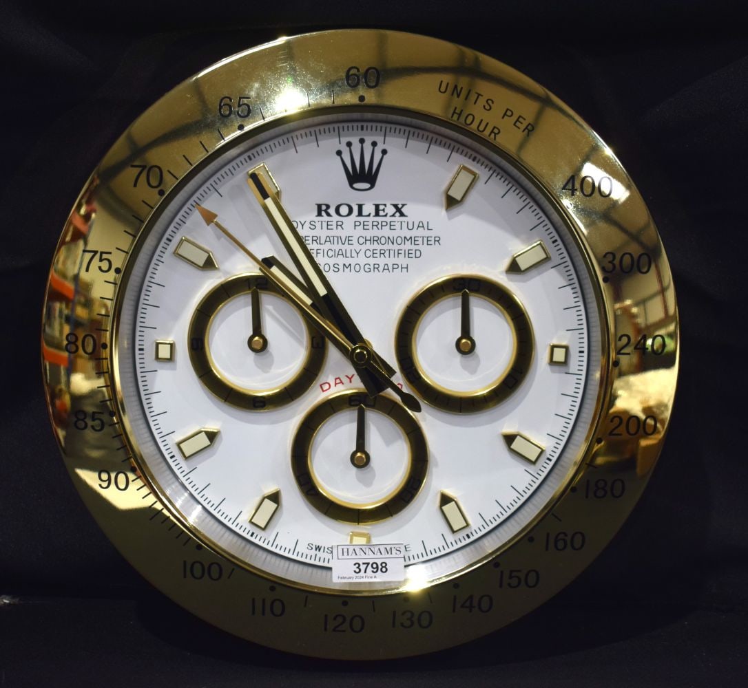 A Contemporary Rolex dealership clock 33 cm.: A Contemporary Rolex dealership clock 33 cm.