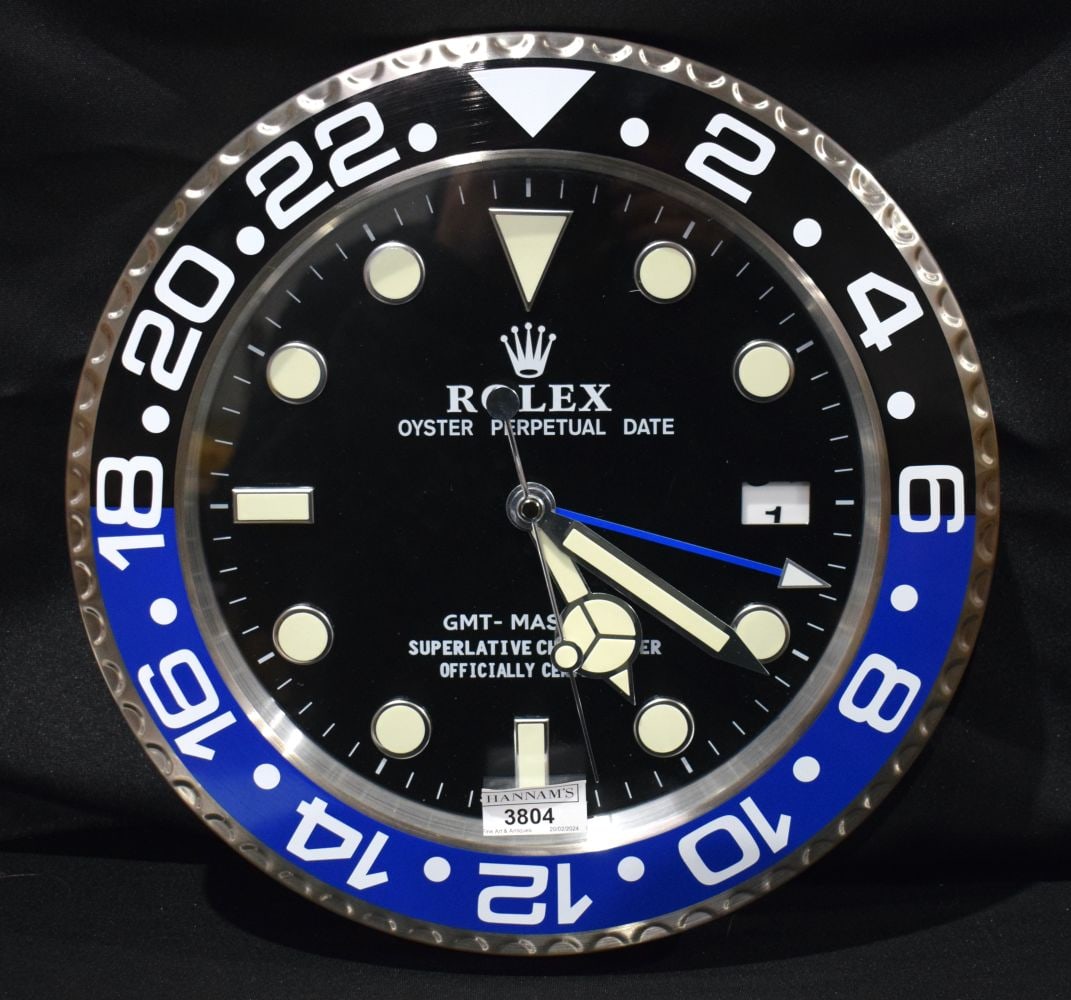 A Contemporary Rolex dealership clock 33 cm.: A Contemporary Rolex dealership clock 33 cm.