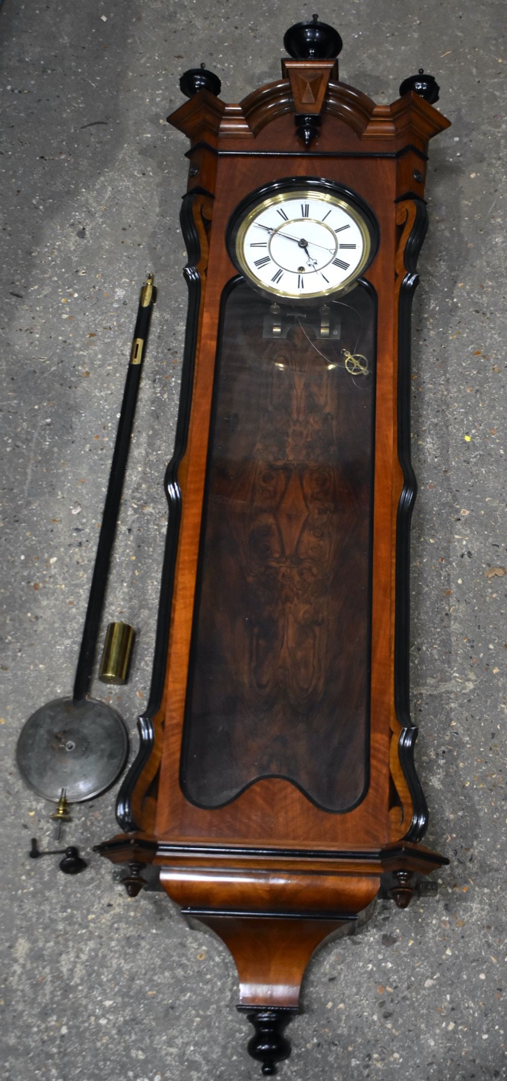 A VERY LARGE VIENNA REGULATOR HANGING WALL CLOCK of monumental proportions, with large enamelled dia: A VERY LARGE VIENNA REGULATOR HANGING WALL CLOCK of monumental proportions, with large enamelled dial. 178 cm x 56 cm. Note: Vienna wall clocks, also known as Vienna regulators, are a type of wall clo