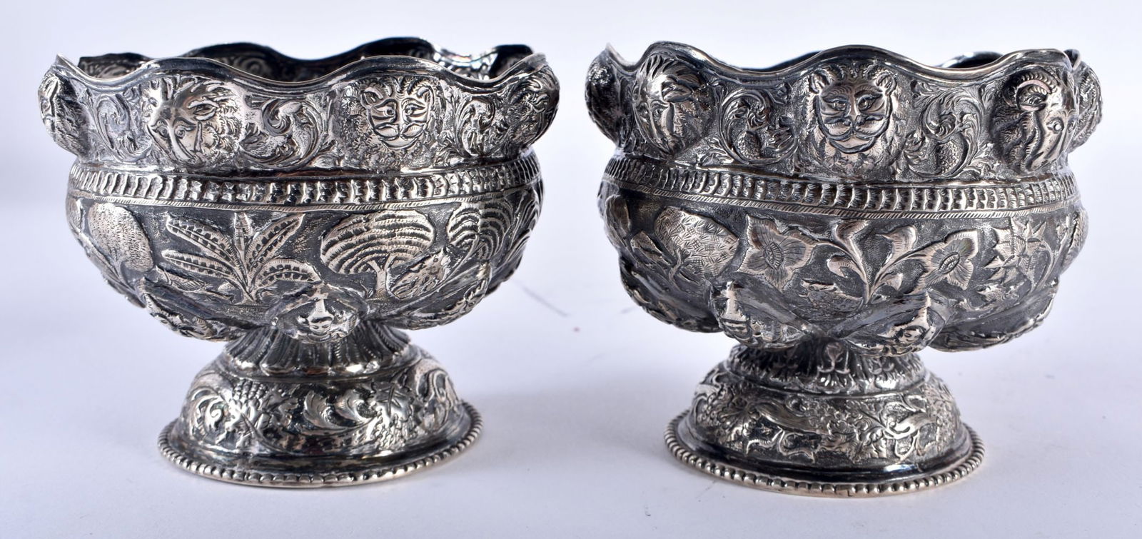 A PAIR OF 19TH CENTURY INDIAN SILVER REPOUSSE BOWLS decorated with figures. 286 grams. 10.5 cm x 8.2 (1 of 5)