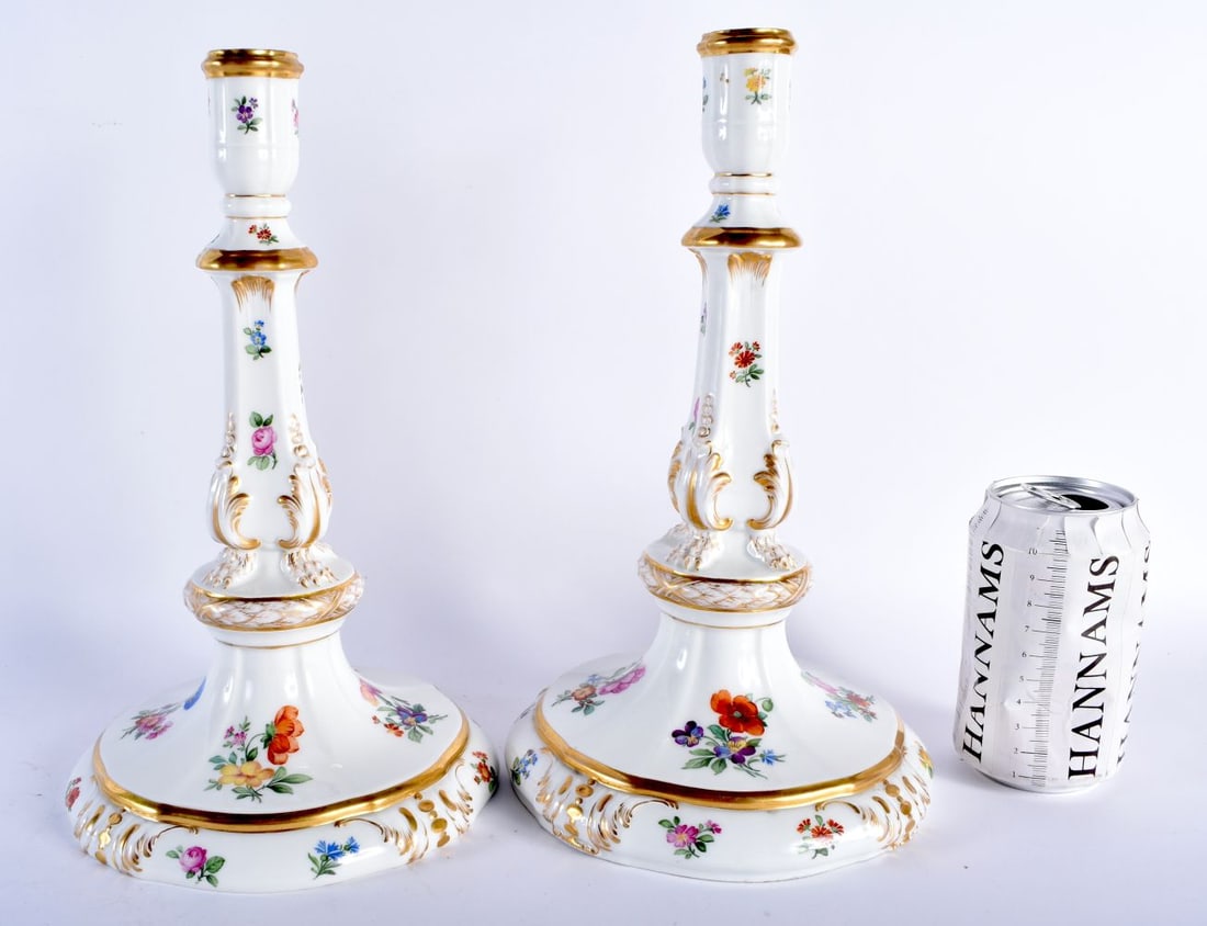 A LARGE PAIR OF 19TH CENTURY GERMAN KPM BERLIN PORCELAIN CANDLESTICKS painted with floral sprays. 29: A LARGE PAIR OF 19TH CENTURY GERMAN KPM BERLIN PORCELAIN CANDLESTICKS painted with floral sprays. 29 cm x 15cm.