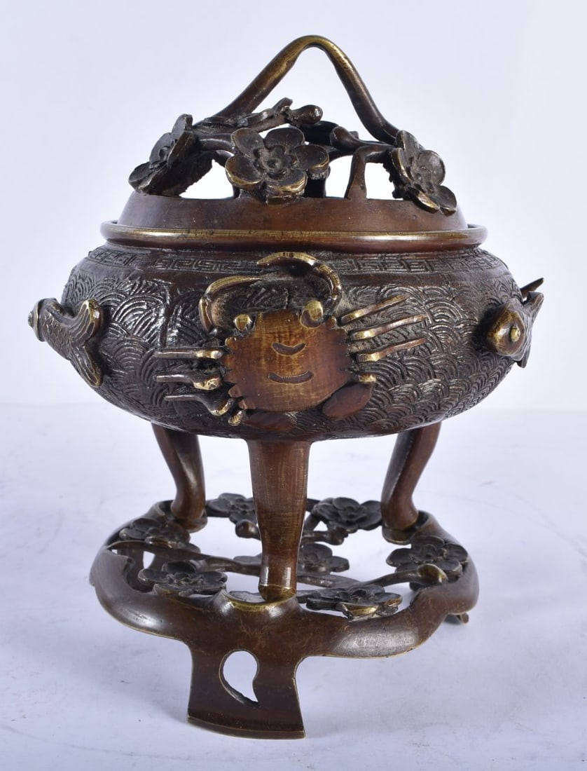 A CHINESE QING DYNASTY BRONZE CENSER AND COVER decorated with crustaceans and vines, upon a floral e (1 of 6)