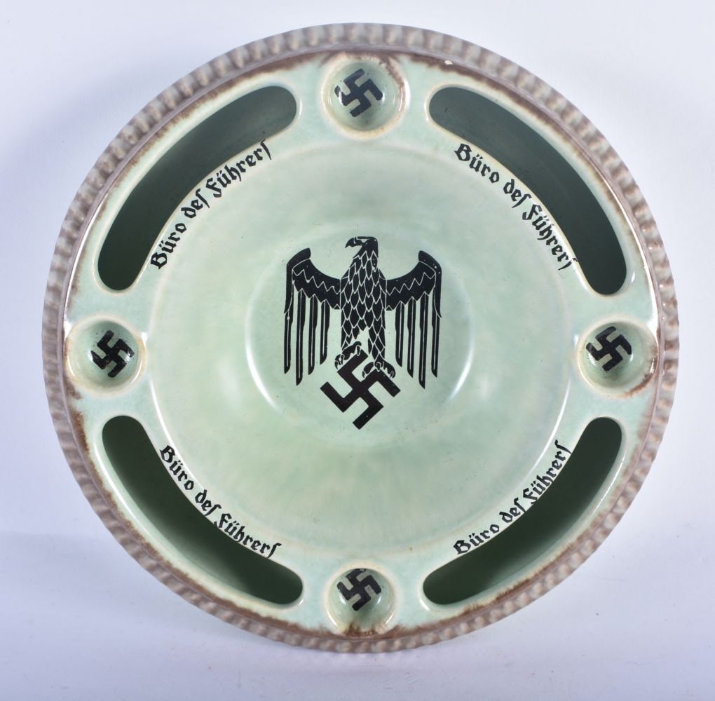 AN UNUSUAL GERMAN POTTERY ASHTRAY of WWII military interest. 15 cm diameter. (1 of 3)