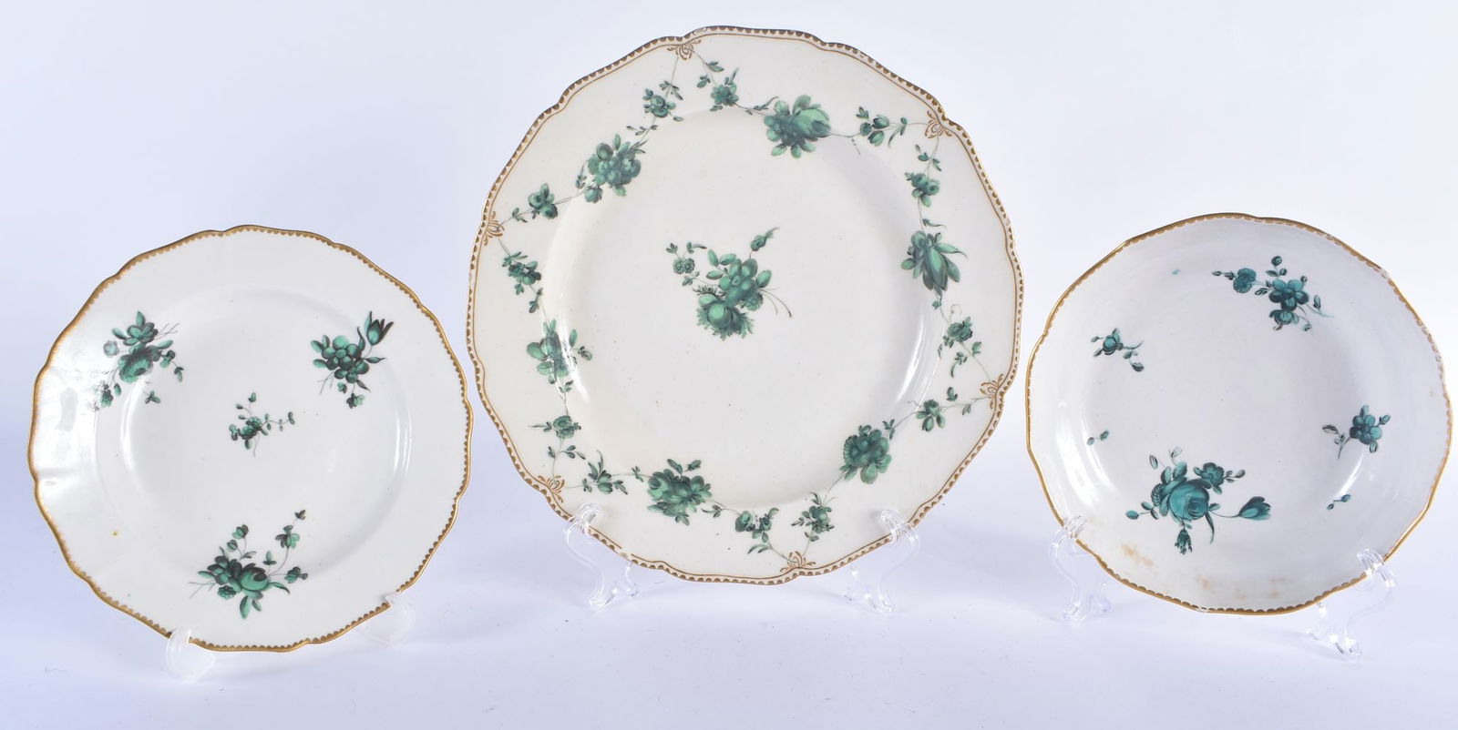 Chelsea Derby plate painted with festoons of green roses, gold anchor mark, and two puce mark small (1 of 5)