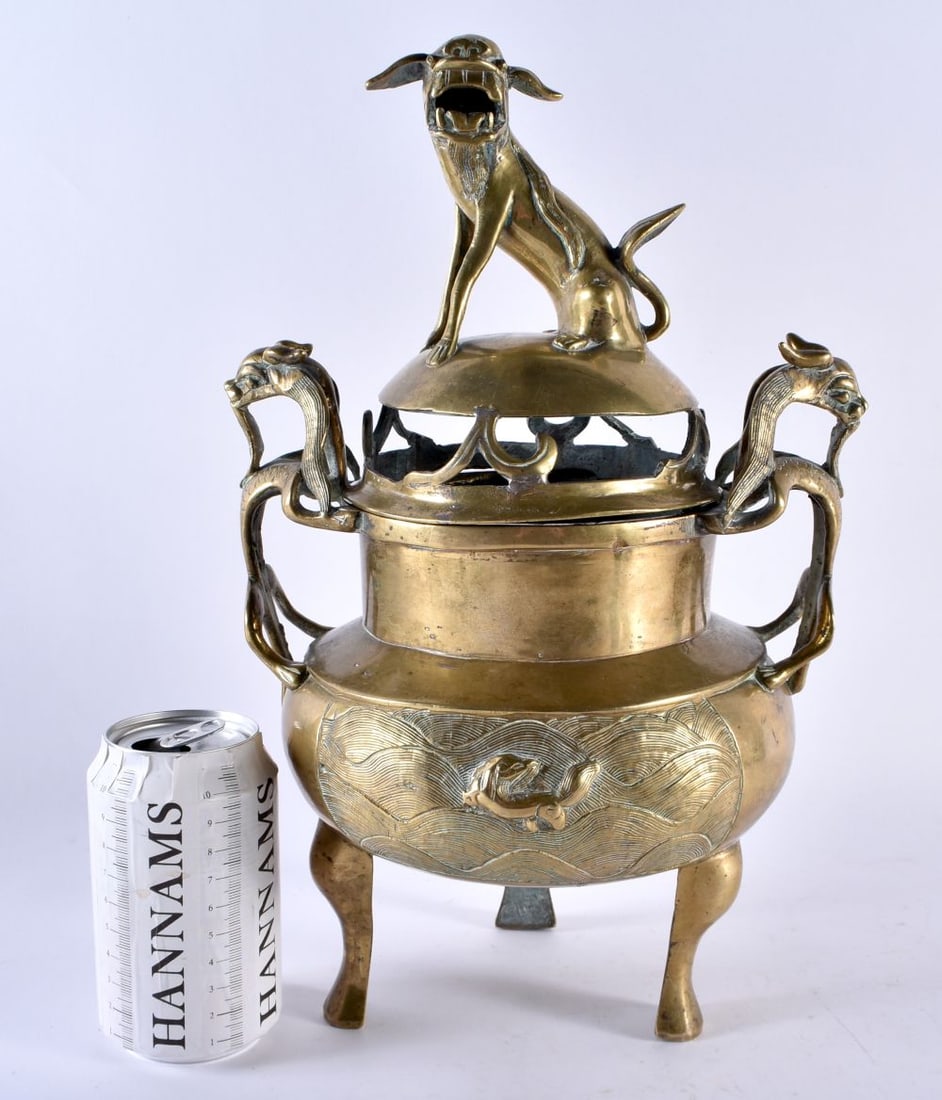 A LARGE 19TH CENTURY CHINESE TWIN HANDLED BRONZE CENSER AND COVER bearing Xuande marks to base, with (1 of 8)