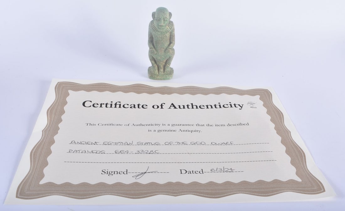 AN ANCIENT EGYPTIAN STATUE OF THE GOD DWARF PATALKOS 664-332 BC. 10 cm high. (1 of 4)