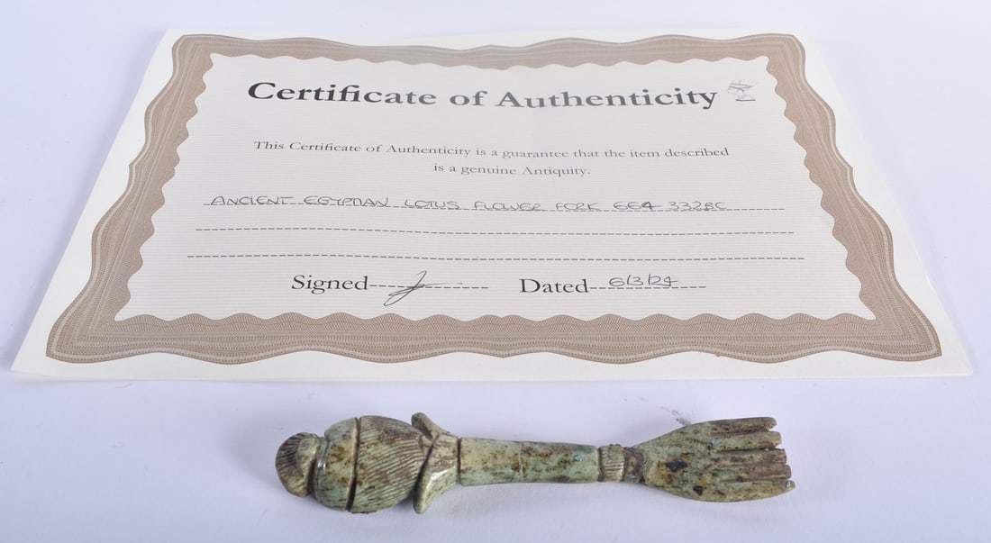 AN ANCIENT EGYPTIAN FLOWER FORK 664-332 BC. 15 cm long.: AN ANCIENT EGYPTIAN FLOWER FORK 664-332 BC. 15 cm long.