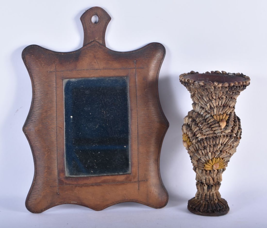 AN UNUSUAL ANTIQUE COUNTRY HOUSE SHELL OVERLAID POTTERY VASE together with a leather mirror. Largest (1 of 6)