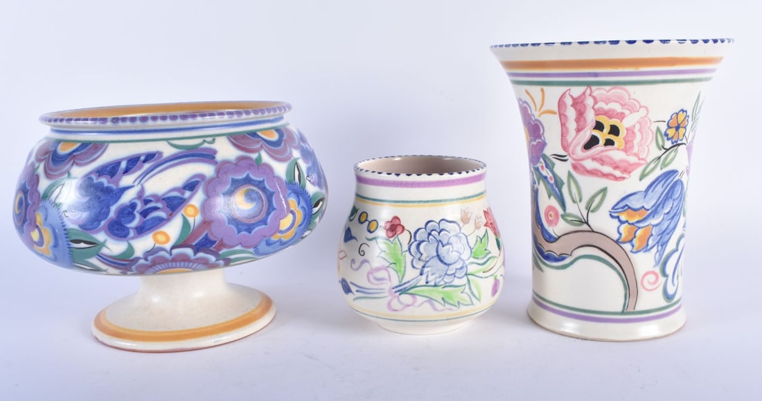 THREE POOLE POTTERY VASES. Largest 14cm x 18cm. (3): THREE POOLE POTTERY VASES. Largest 14cm x 18cm. (3)