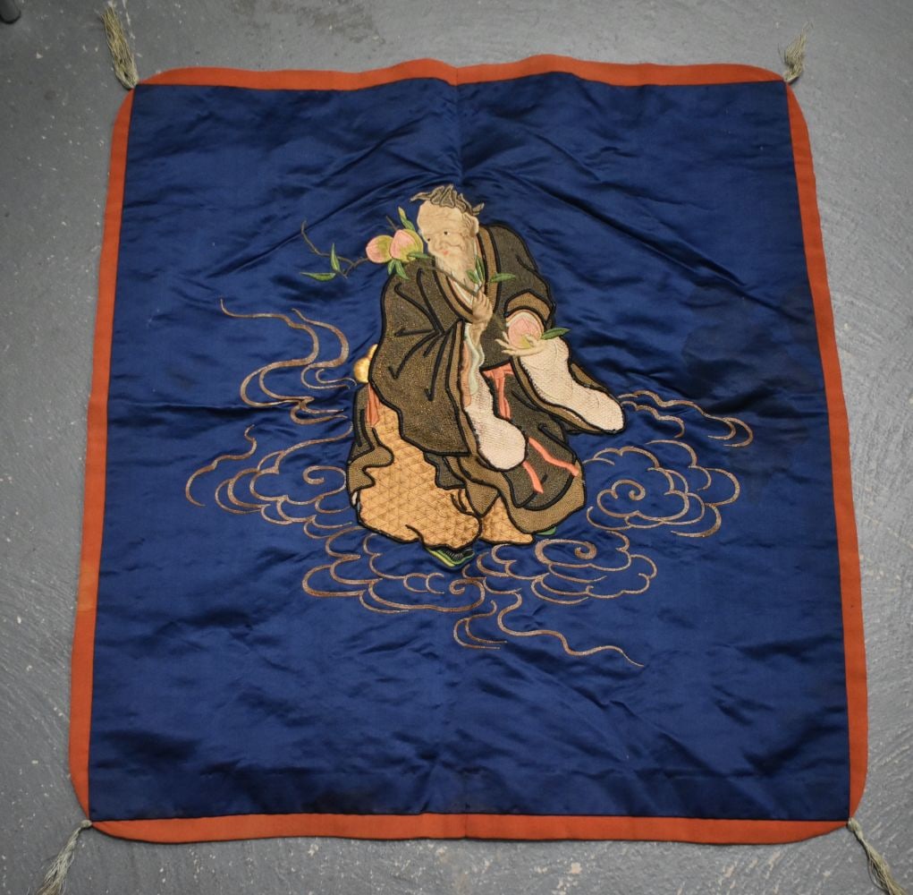 A Chinese Silk Panel of a Sage Holding a Peach Blossom. 68cm x 71cm (1 of 2)