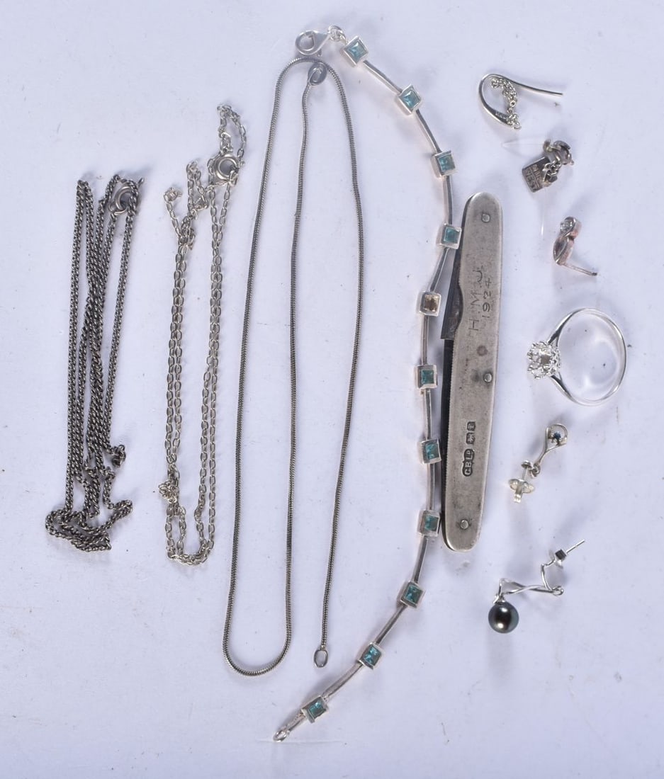 A Group of Miscellaneous Silver items incl Ring, Gem Set Bracelet, 5 odd earrings, 3 chains and a Pe (1 of 5)