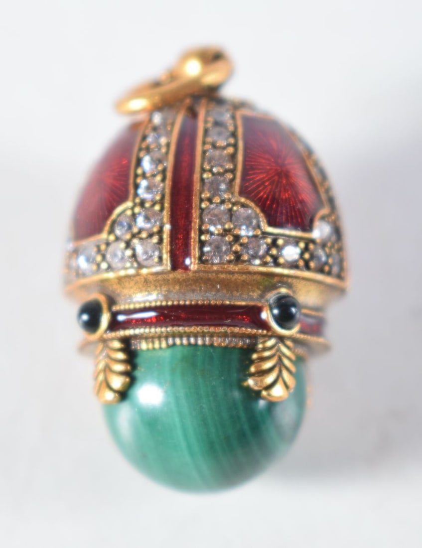 A Continental Silver Gilt, Enamel and Malachite Egg Pendant.  Stamped 84, 2.6 cm x 1.7cm, weight 10. (1 of 3)