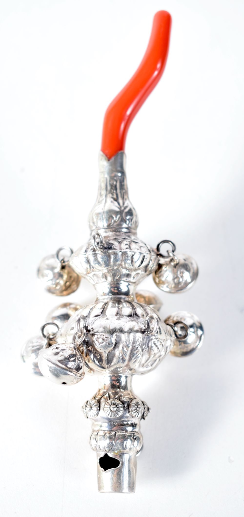 A Silver Babies Rattle with Coral Teether. 13.8 cm x 5.1cm. weight 56g: A Silver Babies Rattle with Coral Teether. 13.8 cm x 5.1cm. weight 56g